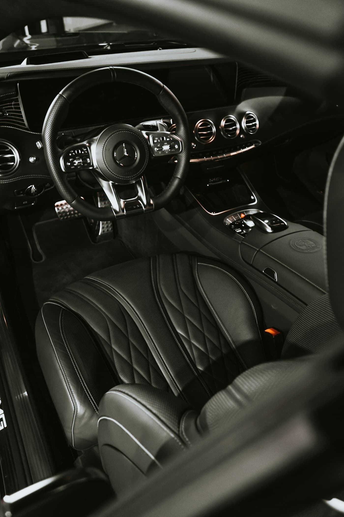 Black diamond-stitched leather interior, detailed and spotless